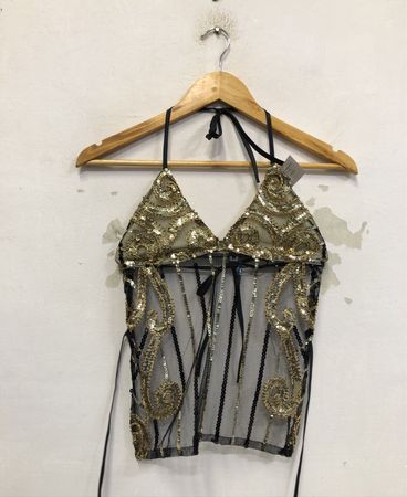 Top à col halter en sequins noir et or