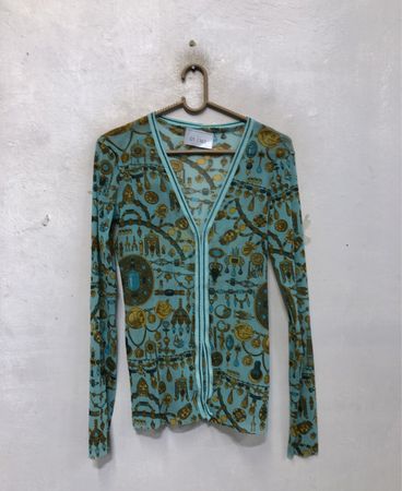 Türkisblauer Langarm-Cardigan mit kunstvollem Muster