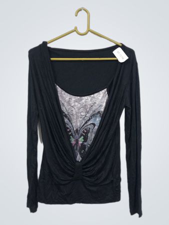 Black long sleeve top with butterfly graphic