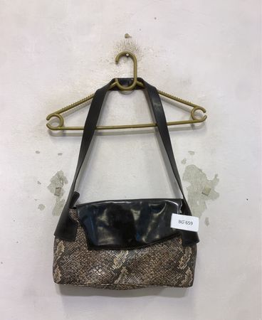 Bag with snake print and black flap