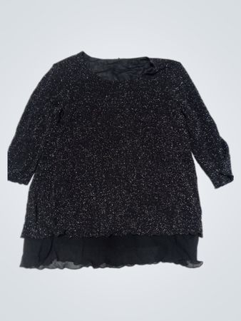Schwarzes glitzerndes Top mit Lagen