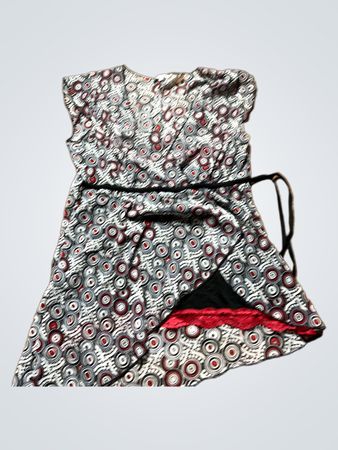 Women's sleeveless dress with red, white and black circles pattern