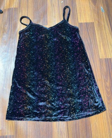 Glitzerndes schwarzes Oberteil