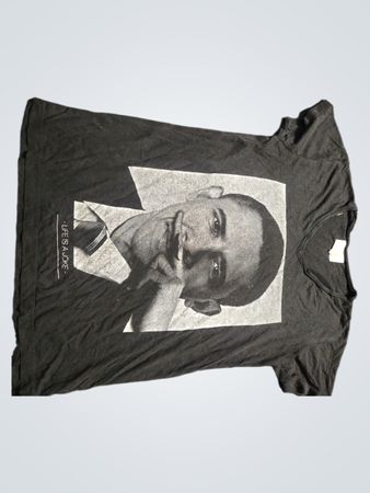 Black T-shirt with Obama graphic and text LIFE IS A JOKE