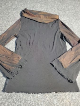 Black cowl neck long sleeve top with sheer sleeves