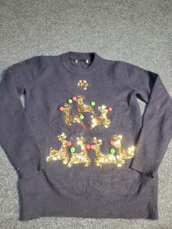 Christmas Sweater with Reindeer and Pom Poms
