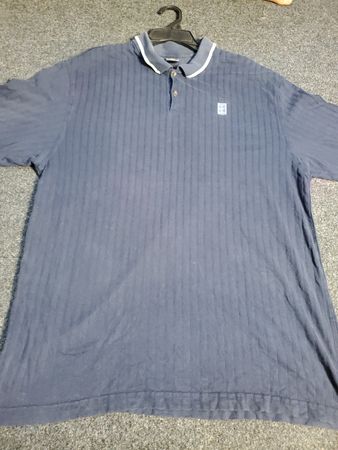Nike Men's Navy Blue Striped Polo Shirt