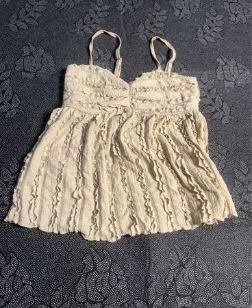 Cream textured cami with ruffles