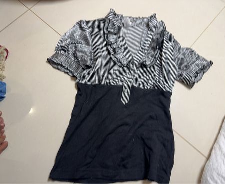 Black and white striped top with ruffles