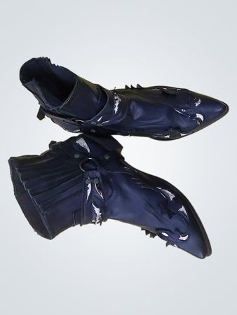 Black Pointed Toe Boots with Decorative Accents