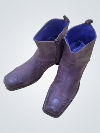 Brown square-toe boots with blue lining