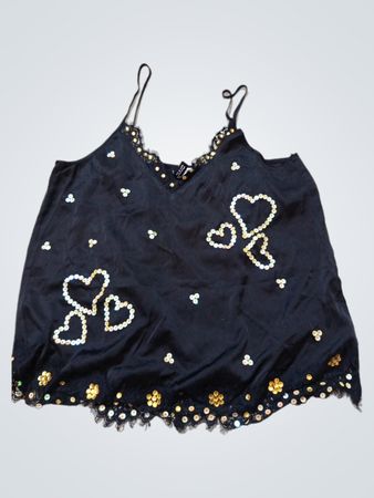 Schwarzes Top mit Herzen und Pailletten