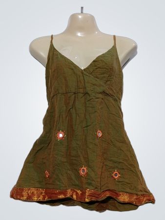 Green camisole with decorative mirrors and gold trim