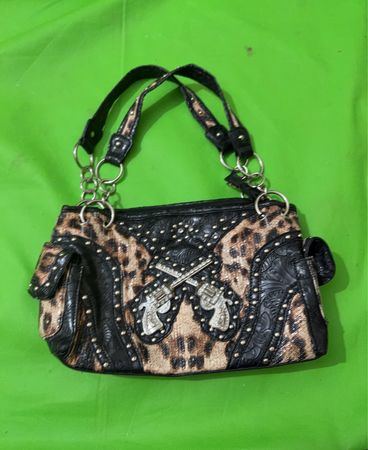 Leopard Print Handbag with Crossed Guns Embellishment