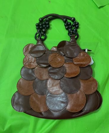 Brown leather shoulder bag with beaded handles