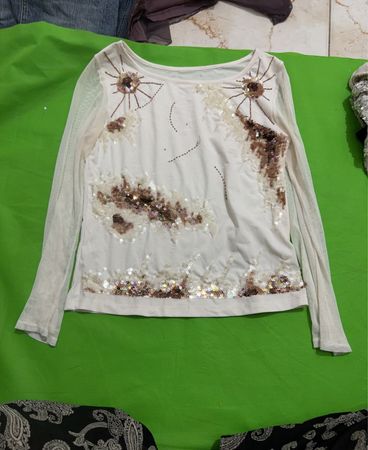 White long-sleeve top with sequins and embellishments
