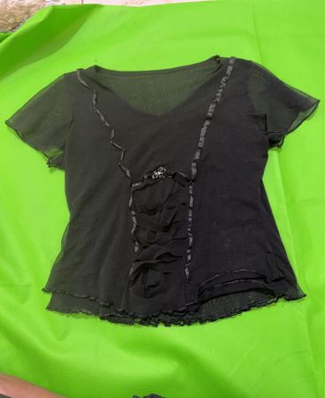 Schwarzes transparentes Netz Rüschencorsett-Top