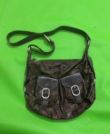 Brown dp patterned shoulder bag with two front pockets