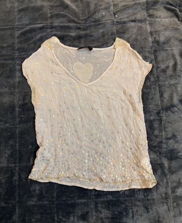 Top da donna con scollo a V e cuore di paillettes