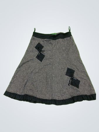 Gray skirt with black trim and bows