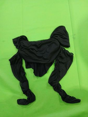 Black garment with zipper and size M label