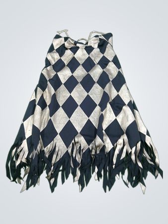 Black and gold diamond pattern dress with fringe and chain detail