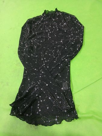 Schwarzes Mesh-Top mit Sternprint