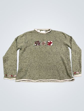 Grüner Strickpullover mit besticktem Design