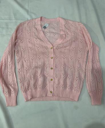 Rosa Strickjacke