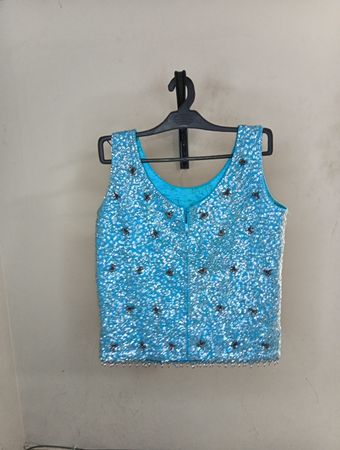 Blauer Paillettentop ohne Ärmel