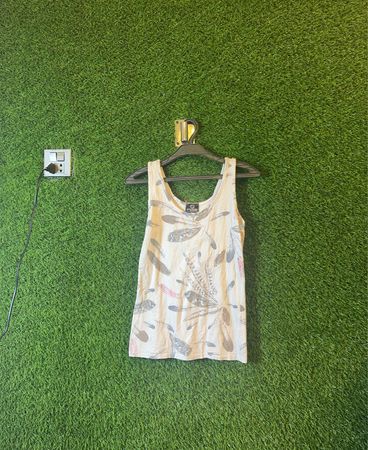 No Sleeves, All Drip Summer Tops