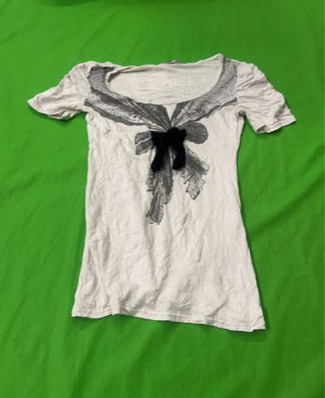 White Women's Top with Black Bow