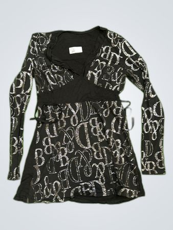 Black dress with silver lettering on sleeves