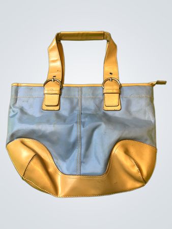 Hellblaue und beige Tragetasche