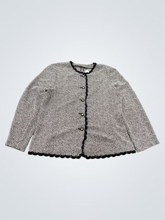 Schwarz-weiß gemusterte Jacke mit schwarzem Besatz