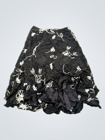 Schwarzer Midirock mit Blumenmuster