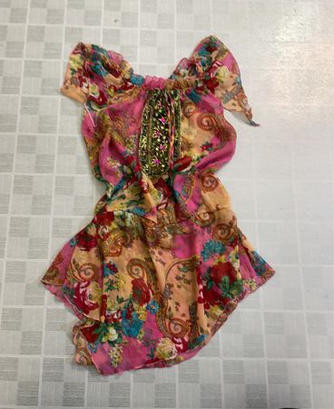 Pink floral print top with embellishments