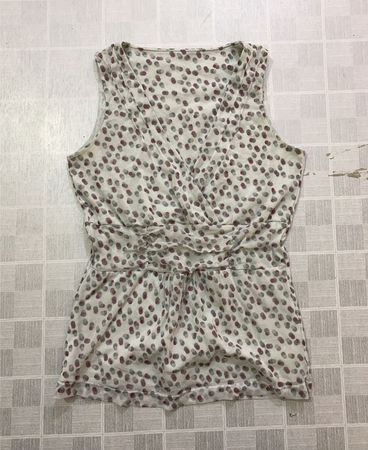 White top with polka dot pattern