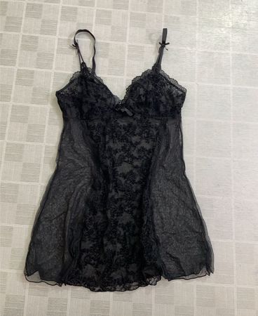 Schwarzes durchsichtiges Spitzen-Unterkleid