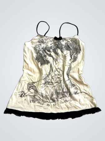 Cremefarbenes Tanktop mit schwarzem Besatz und Grafikdruck