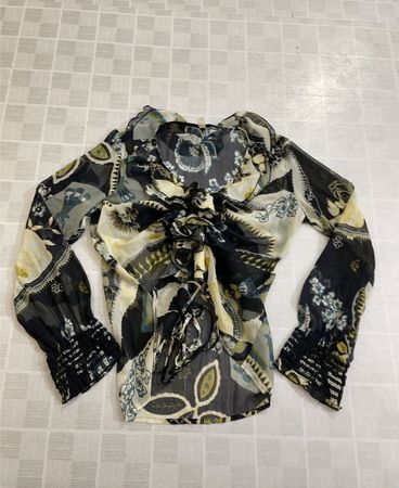 Blouse transparente à imprimé floral