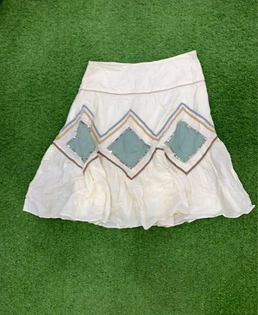 White Skirt with Blue and Gold Accents