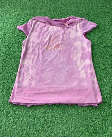 Pink tie-dye dress with glitter sleeves and lace trim