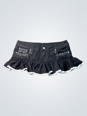Schwarzer Jeansrock mit weißer Spitzenborte und Pailletten-Taschen