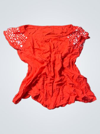 Orange Bluse mit weißer geometrischer Stickerei