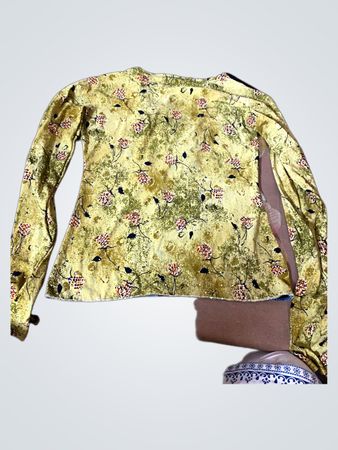Yellow floral long sleeve top with black accents