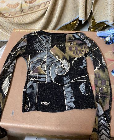 Long sleeve abstract print top