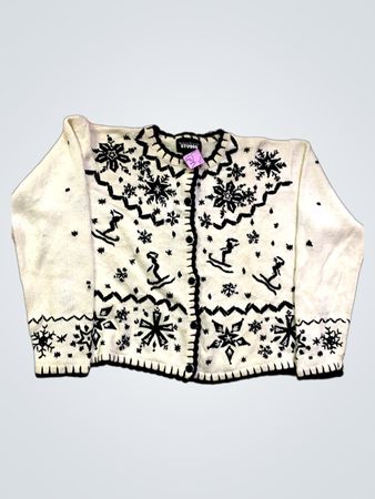 Weißer Strickpullover mit schwarzem Schneeflockenmotiv