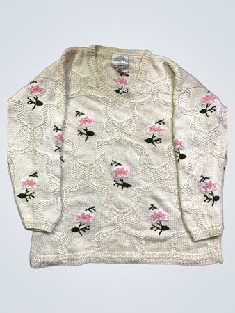 Handgestrickter Internationale Express Pullover