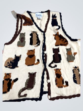 Cream knitted vest with assorted cat patterns and scalloped trim